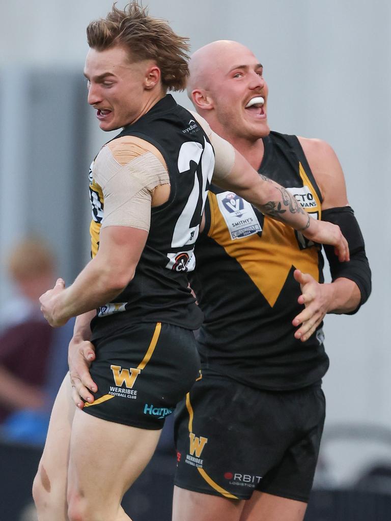 Aidan Johnson and Jay Dahlhaus celebrate a goal. Picture: Rob Lawson/AFL Photos via Getty Images