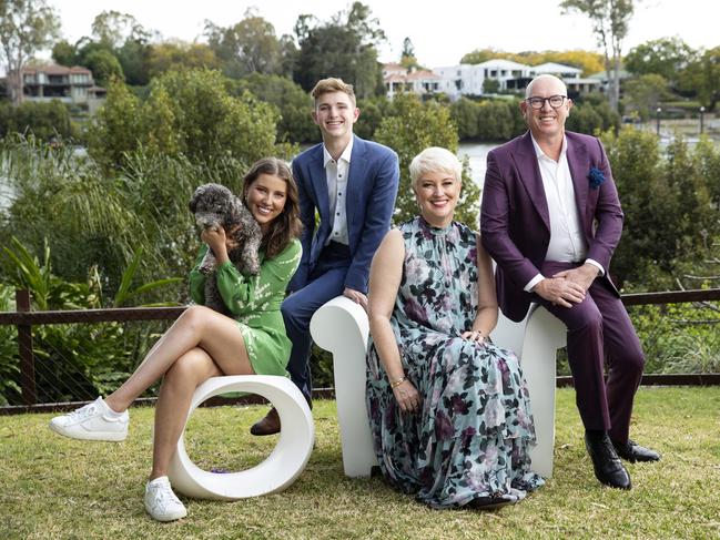 Stuart Giles and Cathie Reid at their riverfront home in Indooroopilly, which they are selling. Image supplied.