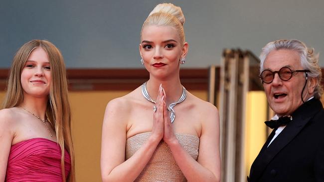 Australian actor Alyla Browne (L), British-US actress Anya Taylor-Joy (C) and Australian director and screenwriter George Miller arrive for the screening of the film "Furiosa: A Mad Max Saga" at the 77th edition of the Cannes Film Festival. Picture: AFP