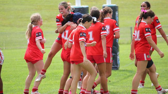 The Illawarra Steelers Lisa Fiaola Cup side celebrate a try. Picture: Kevin Merrigan