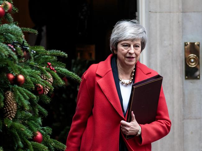 LONDON, ENGLAND - DECEMBER 04: British Prime Minister Theresa May leaves Number 10 Downing Street on December 04, 2018 in London, United Kingdom. MPs are debating whether the Government committed contempt when it failed to publish full legal advice on Brexit. The issue needs to be resolved before debate on the Brexit deal can commence ahead of the 'Meaningful Vote' next Tuesday. (Photo by Jack Taylor/Getty Images)