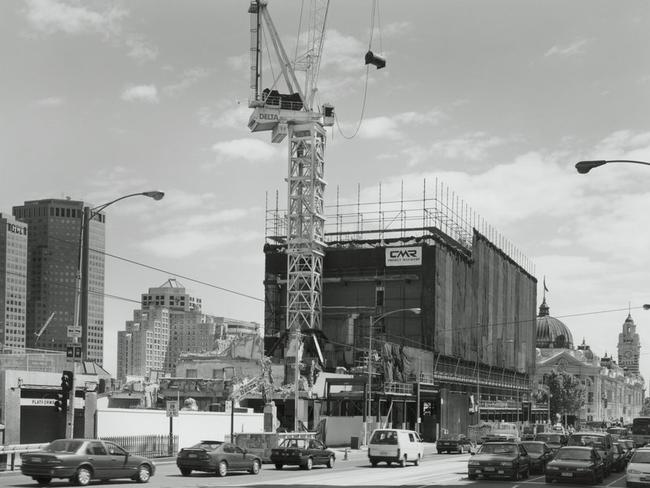 The towers being ripped down. Picture: SLV