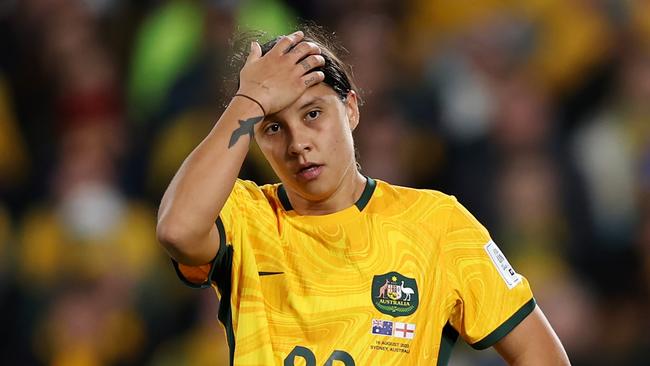 SYDNEY, AUSTRALIA - AUGUST 16: Sam Kerr of Australia reacts after England's second goal  during the FIFA Women's World Cup Australia & New Zealand 2023 Semi Final match between Australia and England at Stadium Australia on August 16, 2023 in Sydney, Australia. (Photo by Alex Pantling - FIFA/FIFA via Getty Images)