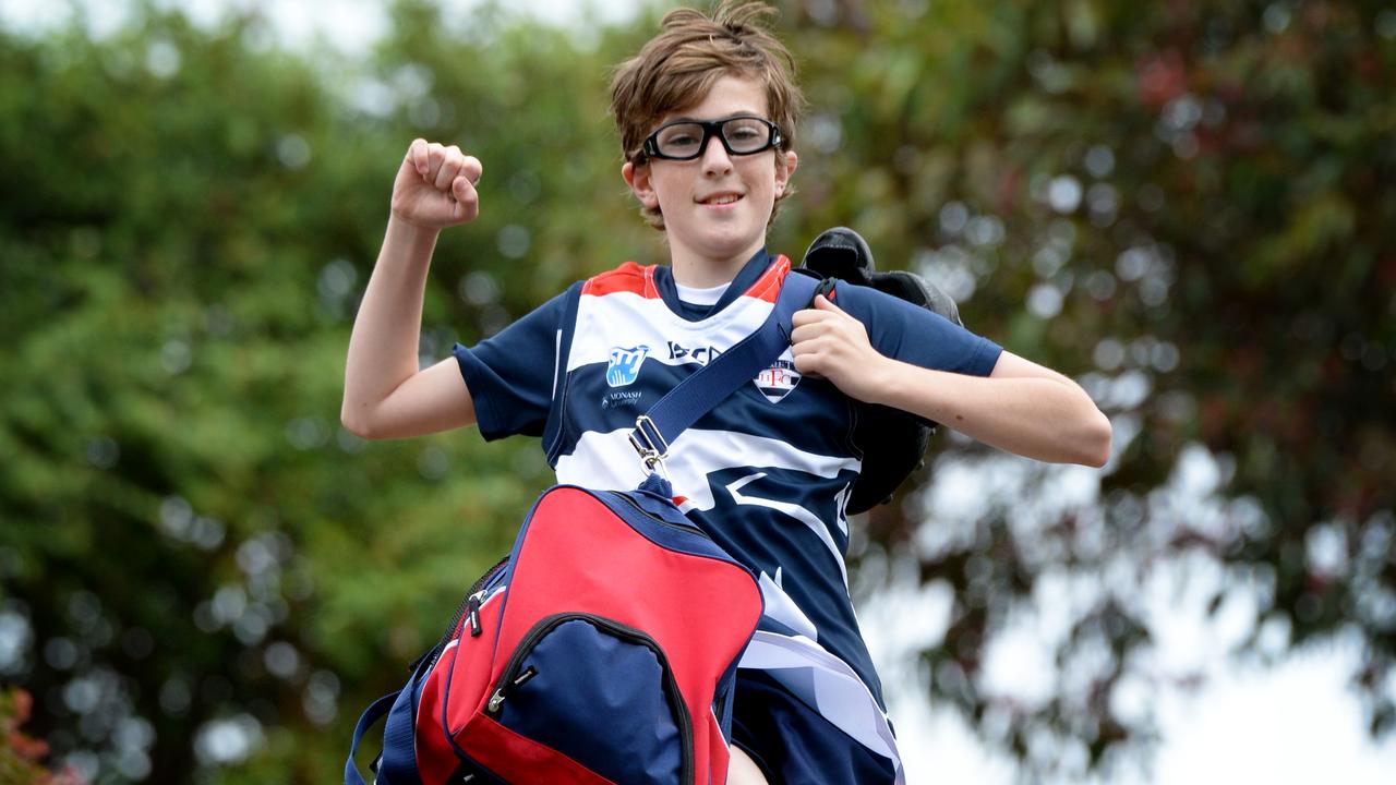 Hawk Hodkinson, 13, ran 7.5km to get to his game with Highett Football Club after his coach forgot to pick him up. Picture: Andrew Henshaw