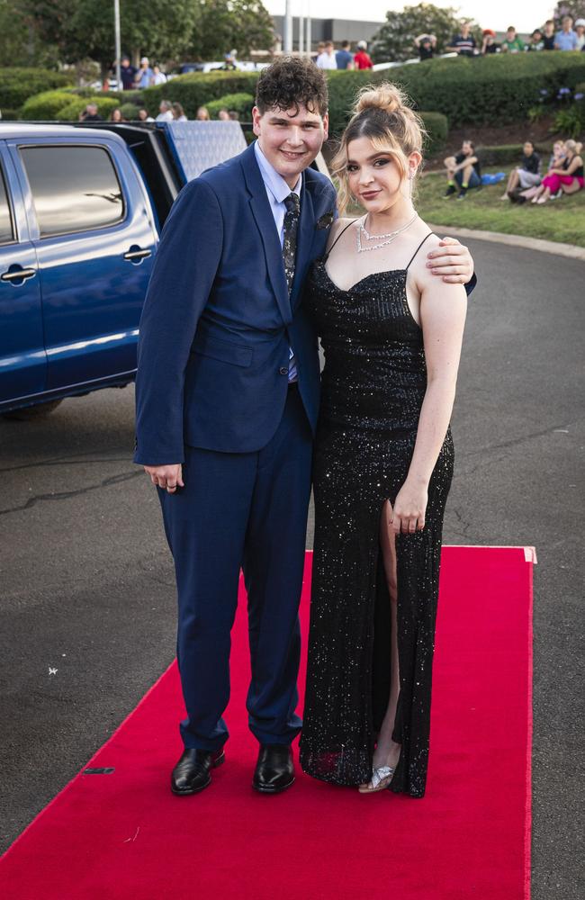 Graduate Logan Watson and partner Mia Watson arrive at Mary MacKillop Catholic College formal at Highfields Cultural Centre, Thursday, November 14, 2024. Picture: Kevin Farmer