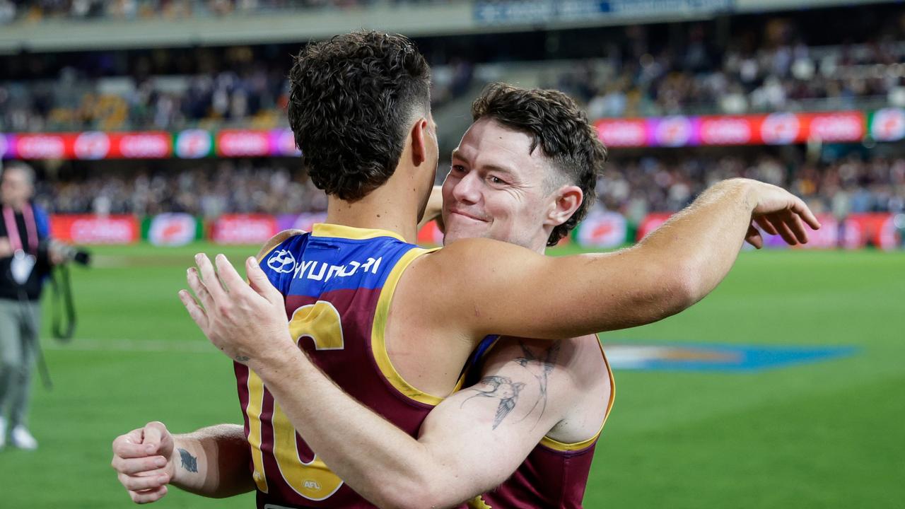 BRISBANE, AUSTRALIA - SEPTEMBER 23: Cam Rayner and Lachie Neale of the Lions celebrate during the 2023 AFL Second Preliminary Final match between the Brisbane Lions and the Carlton Blues at The Gabba on September 23, 2023 in Brisbane, Australia. (Photo by Russell Freeman/AFL Photos via Getty Images)