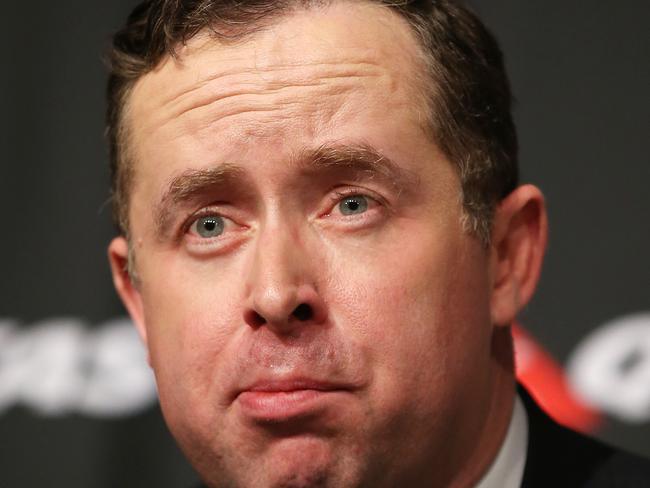 Alan Joyce, chief executive officer of Qantas Airways Ltd., listens during a news conference in Sydney, Australia, on Thursday, Aug. 28, 2014. Qantas, Australia's biggest carrier, forecast a return to profit after posting a record loss as a domestic market share fight with Virgin Australia Holdings Ltd. eases. Photographer: Brendon Thorne/Bloomberg via Getty Images