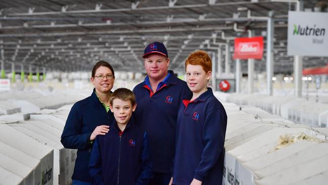 Lauren Damien Philp from Manoora, South Australia with sons Hayden, 12 and Ryan, 13 are pictured at the wool auctions in Melbourne. Picture: Zoe Phillips