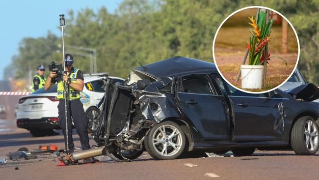 Floral tributes left at the scene of a fatal Car Crash on the Arnhem Highway at Humpty Doo. Picture: Glenn Campbell