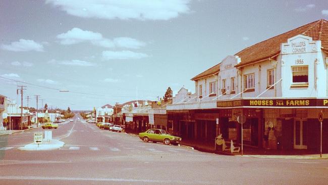 Western side of the Kingaroy and Haly Street intersection, looking south, ca. 1975. A view of the bustling town centre before the installation of traffic lights transformed the flow of movement. Source: Glady Hood, Gary Colquhoun