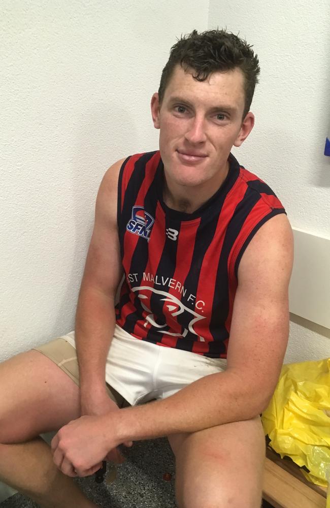 Chris Carey takes a breather after the match.