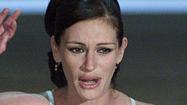 25 Mar 2001 Actress Julia Roberts reacts after winning her Best Actress award at Academy Awards ceremony in Los Angeles. headshot oscars