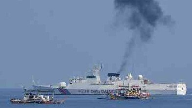 China keeping Filipino boats away from its Scarborough Shoal atoll in the South China Sea. Picture:AFP/Getty Images