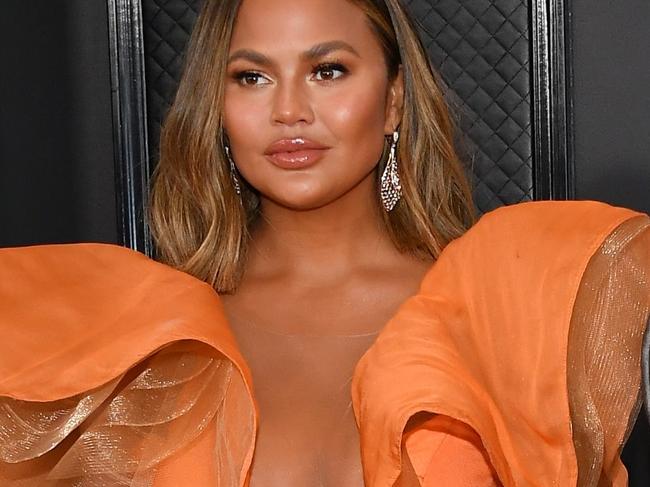 LOS ANGELES, CALIFORNIA - JANUARY 26: Chrissy Teigen and John Legend attends the 62nd Annual GRAMMY Awards at Staples Center on January 26, 2020 in Los Angeles, California. (Photo by Amy Sussman/Getty Images)