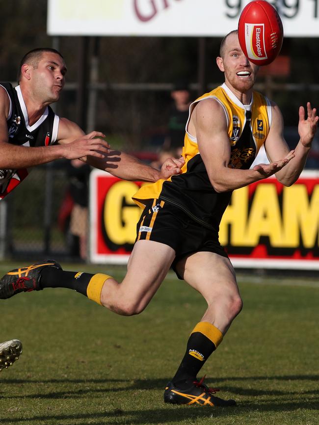 Frankston YCW forward Anthony Bruhn marks. Pictures: Mark Dadswell