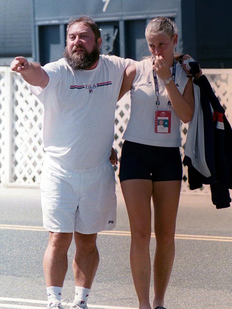 Upset player Jelena Dokic with her father Damir after he got into a dispute with officials at the US Open. Picture: Charles Fowler.