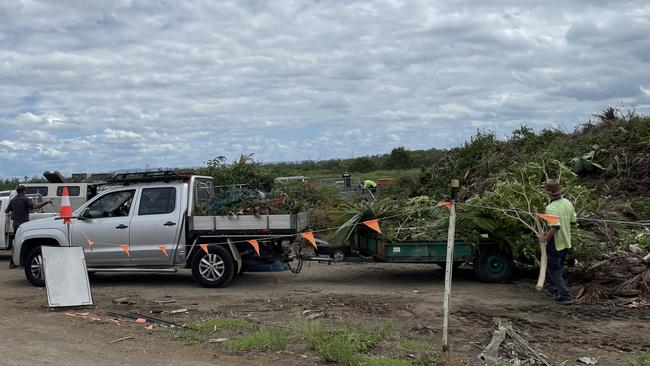 Residents unload green waste at the Rockhampton landfill.