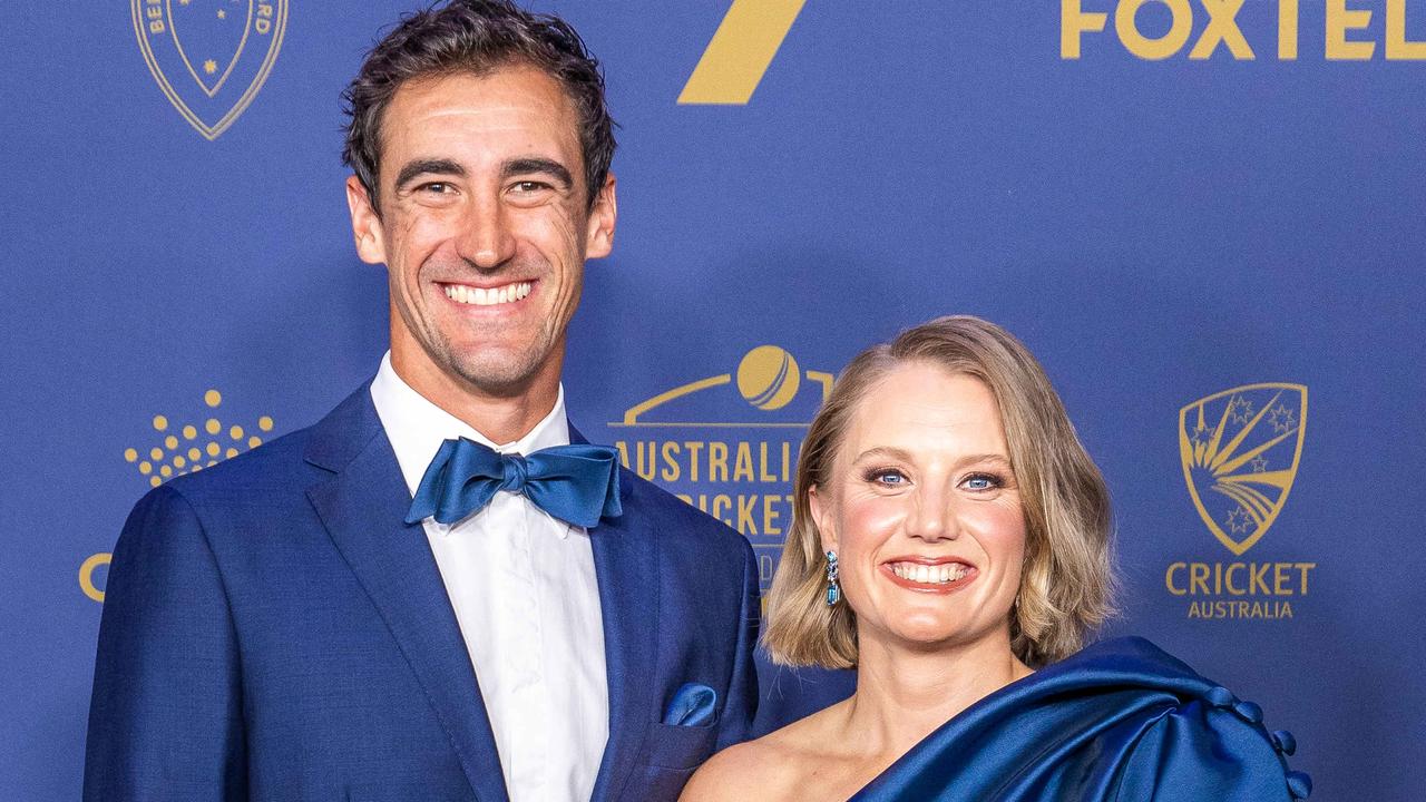 Fans were concerned something may have been wrong with Mitchell Starc or his wife Alyssa Healy (pictured together) after the Aussie quick cited “personal reasons” for pulling out of the Champions Trophy. Picture: Jake Nowakowski