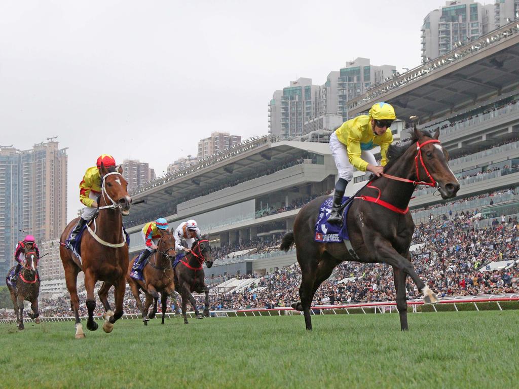 Lucky Sweynesse (yellow cap) and Wellington (blue cap) are set to clash again in the Chairman's Sprint Prize next month. Picture: HKJC
