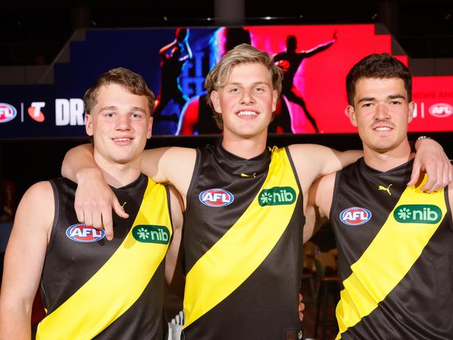 MELBOURNE, AUSTRALIA - NOVEMBER 20: Richmond's draft picks, Sam Lalor, Josh Smillie and Harry Armstrong pose for a photo during the 2024 Telstra AFL Draft at Marvel Stadium on November 20, 2024 in Melbourne, Australia. (Photo by Dylan Burns/AFL Photos via Getty Images)