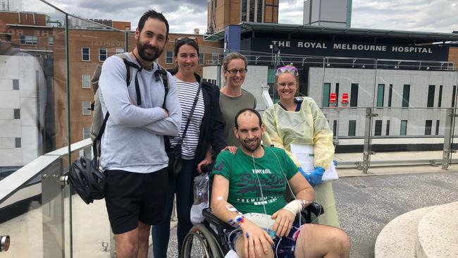 Chris with nurse Amy and his loved ones, snapped during a prearranged outing at the Peter MacCallum Cancer Centre, designed to give Chris time away from ICU. Picture: supplied