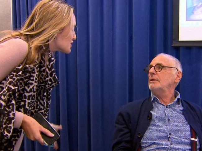 A woman confronts Philip Nitschke at an euthanasia conference. Picture: Nine.