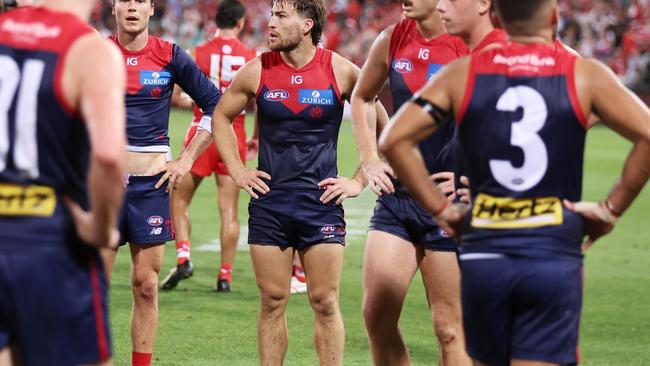 SYDNEY, AUSTRALIA - MARCH 07:  Jack Viney of the Demons and team mates look dejected after the Opening Round AFL match between Sydney Swans and Melbourne Demons at SCG, on March 07, 2024, in Sydney, Australia. (Photo by Matt King/AFL Photos/Getty Images)