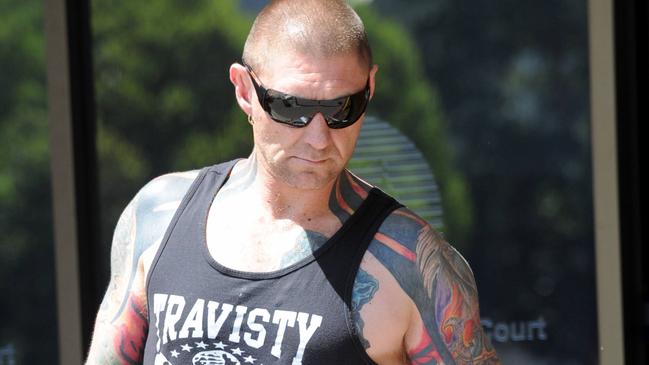 Former Finks bikie Mark Sandery arrives at Port Adelaide Magistrates court to face various traffic and community service offences. His son was shot in the leg during a home invasion recently.