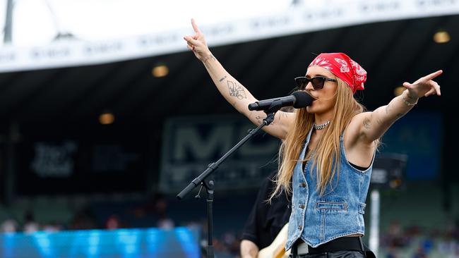 G Flip performs during the 2023 AFLW Grand Final match between The North Melbourne Tasmanian Kangaroos and The Brisbane Lions. Photo: Dylan Burns/Getty.