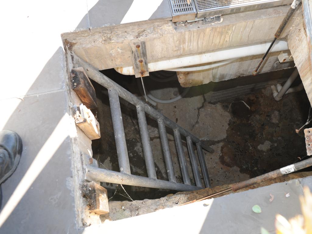 Police discovered a tunnel under John Ibrahim’s pool by pulling on a handle attached to one of the tiles.