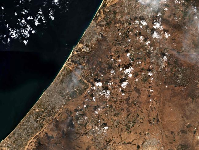 A satellite image depicting plumes of smoke in the border area between southern Israel and the coastal Gaza Strip. Picture: Copernicus Sentinel-2 imagery/AFP