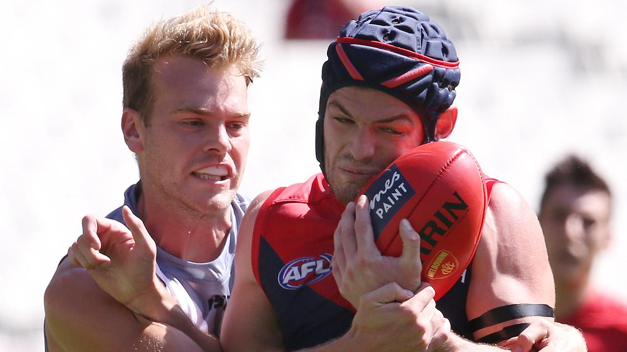 Jack Watts wraps up Angus Brayshaw on Saturday. Picture: Michael Klein.