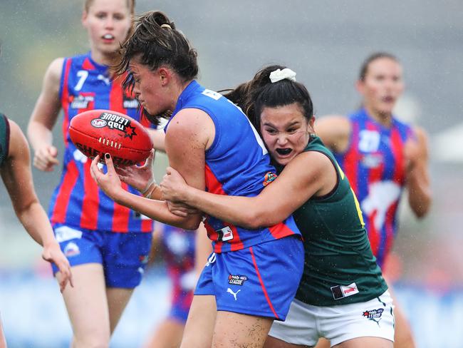 Tasmania Devils V Oakleigh Chargers from North Hobart Oval. Devils Angelica Clark tackles Chargers Emma Chamberlain. Picture: ZAK SIMMONDS