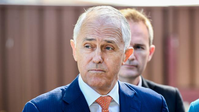 Australian Prime Minister Malcolm Turnbull (left) speaks to the media during a visit to the Teenie Weenies Learning Centre in Panania with Minister for Women Kelly O'Dwyer (right) and Assistant Minister for Finance David Coleman (second right) in Sydney, Monday, April 9, 2018. (AAP Image/Brendan Esposito) NO ARCHIVING