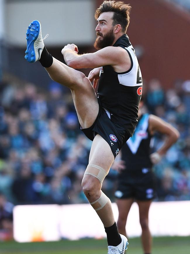 Port Adelaide’s Charlie Dixon  kicks for goal against the Saints at Adelaide Oval. Picture: Mark Brake