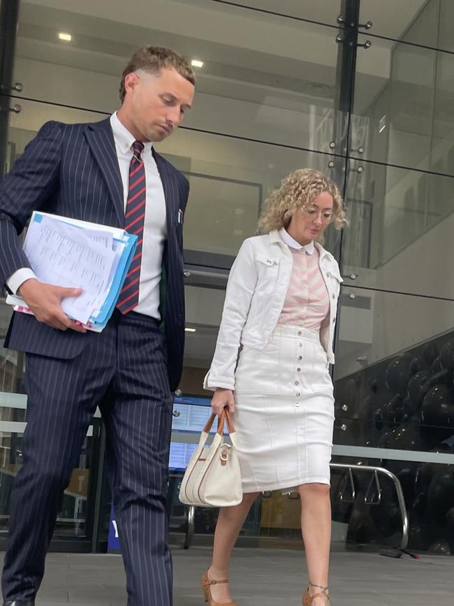 Karly Rae leaving Newcastle Local Court with her solicitor James Janke. Picture: NewsLocal