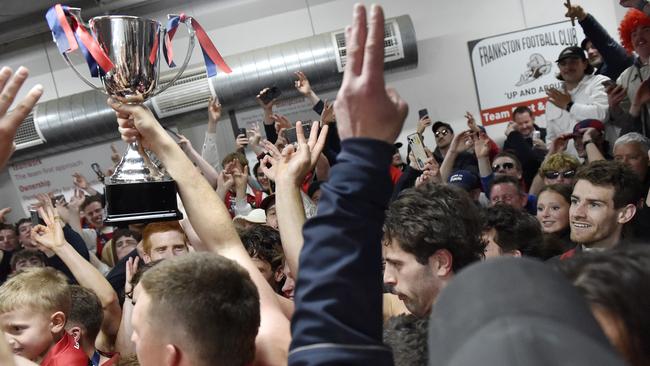 Mt Eliza celebrate in the rooms after their win. Picture: Andrew Batsch