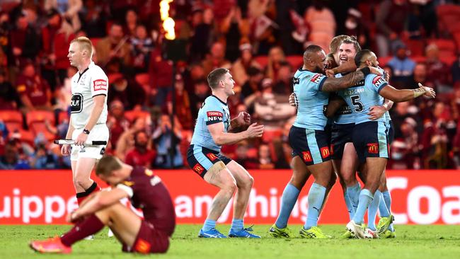 NSW players celebrate victory at Suncorp Stadium. Picture: Getty Images