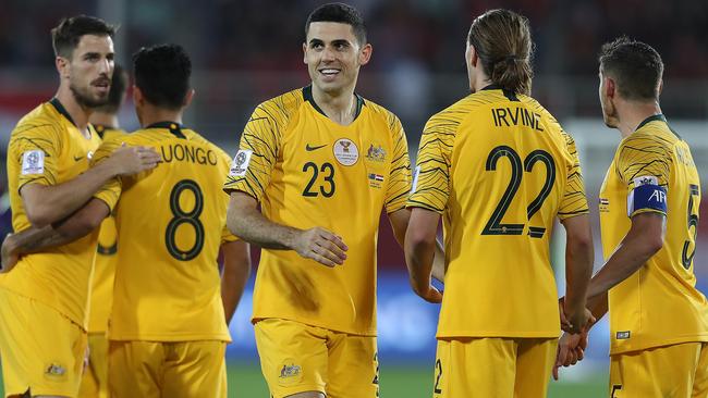 Tom Rogic (C) celebrates his side’s second goal. Picture: Getty