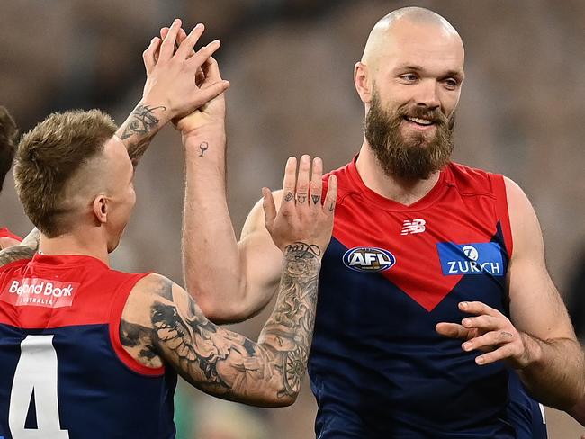 MELBOURNE, AUSTRALIA - JUNE 04: Max Gawn of the Demons is congratulated by team mates after kicking a goal during the round 12 AFL match between the Melbourne Demons and the Sydney Swans at Melbourne Cricket Ground on June 04, 2022 in Melbourne, Australia. (Photo by Quinn Rooney/Getty Images)