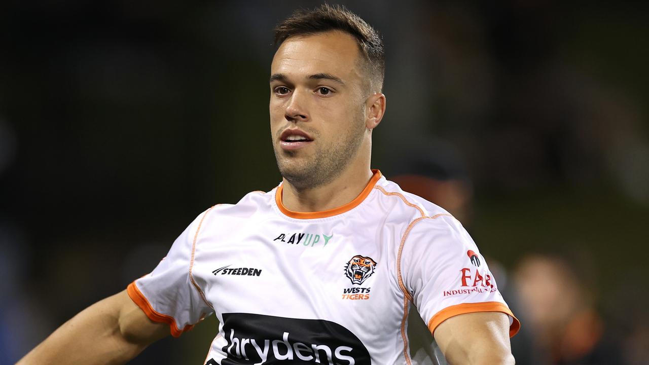 SYDNEY, AUSTRALIA - JUNE 02: Luke Brooks of the Wests Tigers warms up before the round 14 NRL match between Wests Tigers and Canberra Raiders at Campbelltown Stadium on June 02, 2023 in Sydney, Australia. (Photo by Cameron Spencer/Getty Images)