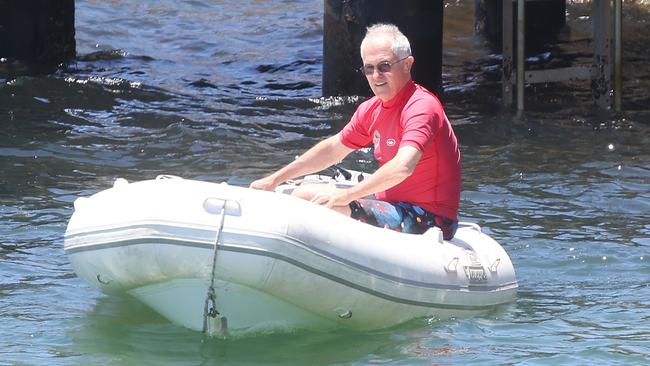 Prime Minister Malcolm Turnbull is snapped without a life jacket on a dinghy. Picture: Matrix