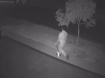 CCTV footage shows a figure holding a machete walking through Wyndham’s Mambourin estate Picture: Supplied.