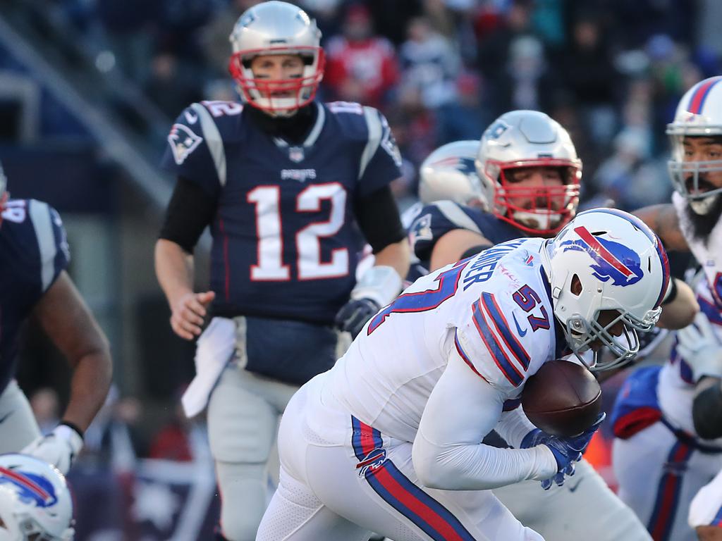 Tom Brady (12) watches as Buffalo Bills' Lorenzo Alexander (57) intercepts his pass during the Patriots’ game against the Bills in 2018. Picture: Matthew J. Lee/The Boston Globe via Getty Images.