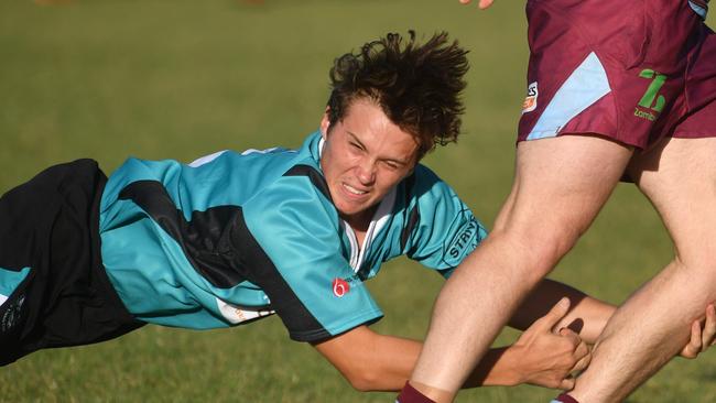 Townsville A Grade rugby union match between Teachers West and Western Suburbs at Warrina Park. Teachers Shamus Howlett and Suburbs Hamish Wood. Picture: Evan Morgan