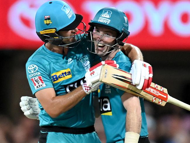 *APAC Sports Pictures of the Week - 2021, February 1* - BRISBANE, AUSTRALIA - JANUARY 29: Jimmy Peirson and Joe Burns of the Heat celebrate victory during the Big Bash League Eliminator Final match between the Brisbane Heat and the Adelaide Strikers at The Gabba, on January 29, 2021, in Brisbane, Australia. (Photo by Bradley Kanaris/Getty Images)