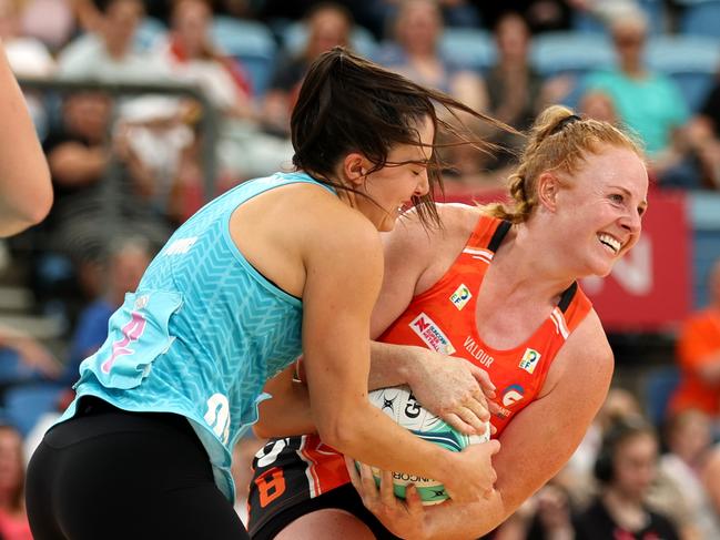 Molly Jovic of the Mavericks competes with Sam Winders of the Giants. Picture: Mark Metcalfe/Getty Images for Netball Australia.