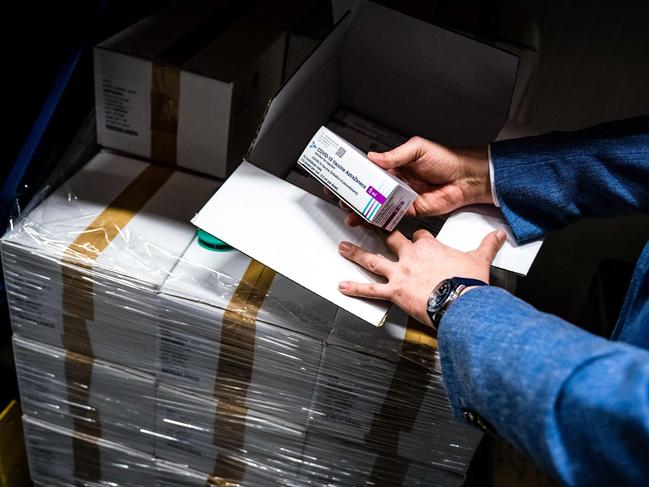 Boxes of vials of AstraZeneca vaccines in cold storage. Picture: AFP