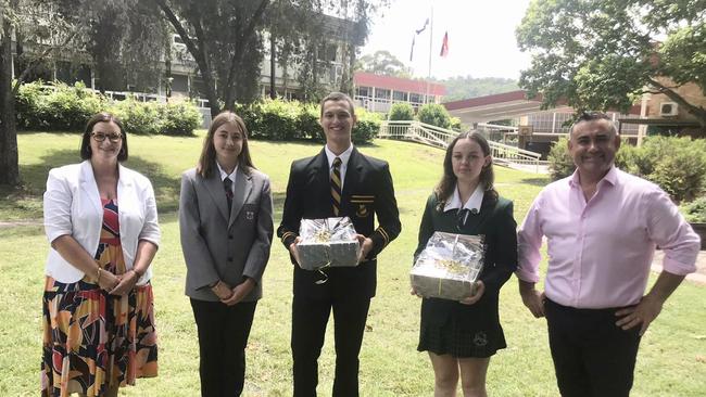 NSW Education Minister Sarah Mitchell with Rivers Secondary College Lismore High Campus students Odessa Smith, Julian Thompson, Danielle Bindley and Deputy Premier John Barilaro in Lismore before the school was damaged “beyond repair”.