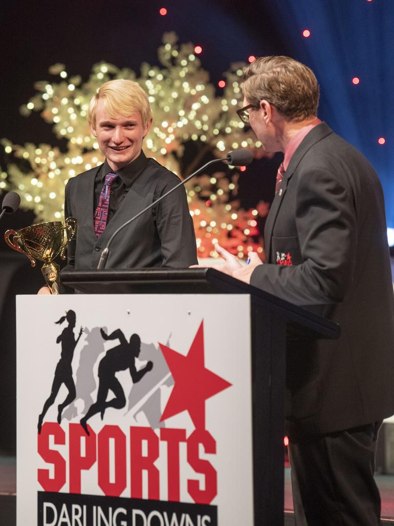 Geordie Cowdroy received the Junior Sports Star of the Year Runner-Up from David Russell, Toowoomba Land Rover. Sports Darling Downs Sports Stars of the Year dinner. Saturday, February 11, 2023. Picture: Nev Madsen.